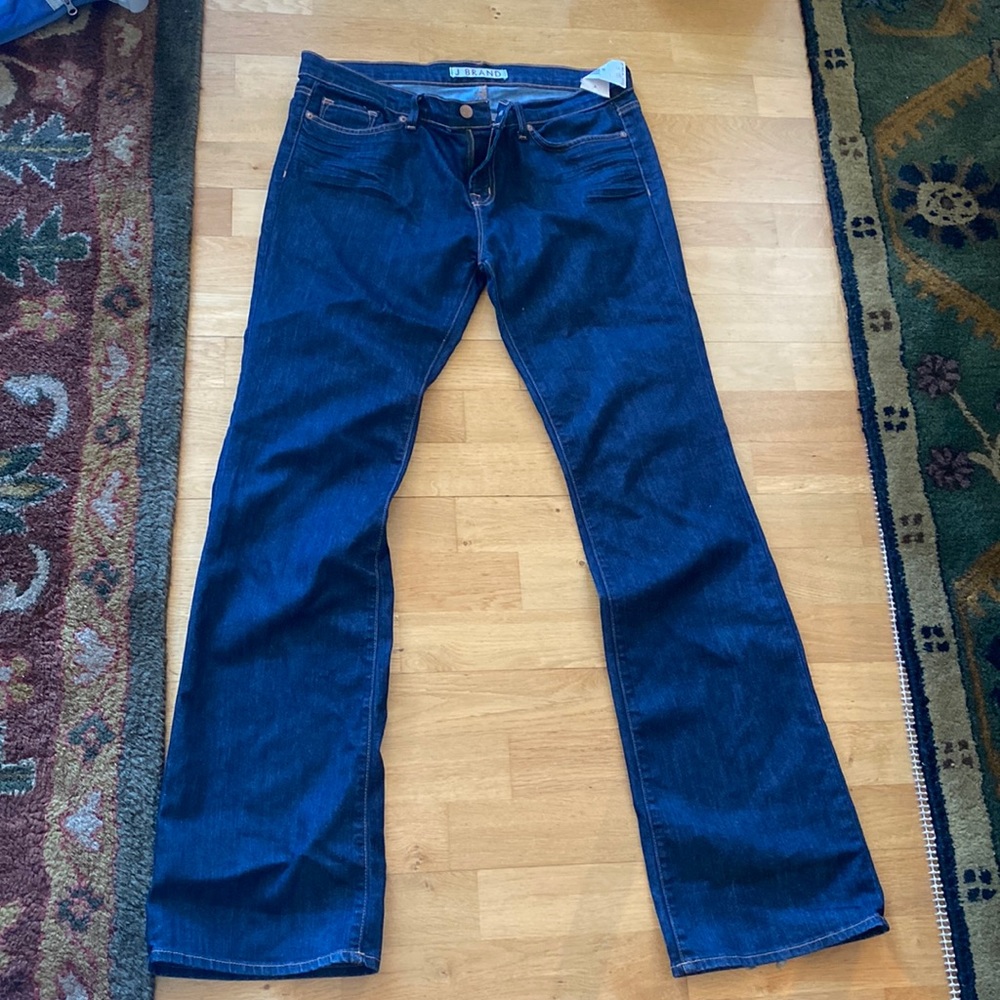 J. Brand dark wash jeans straight leg with a slight flare bottom. Size 32 NWT